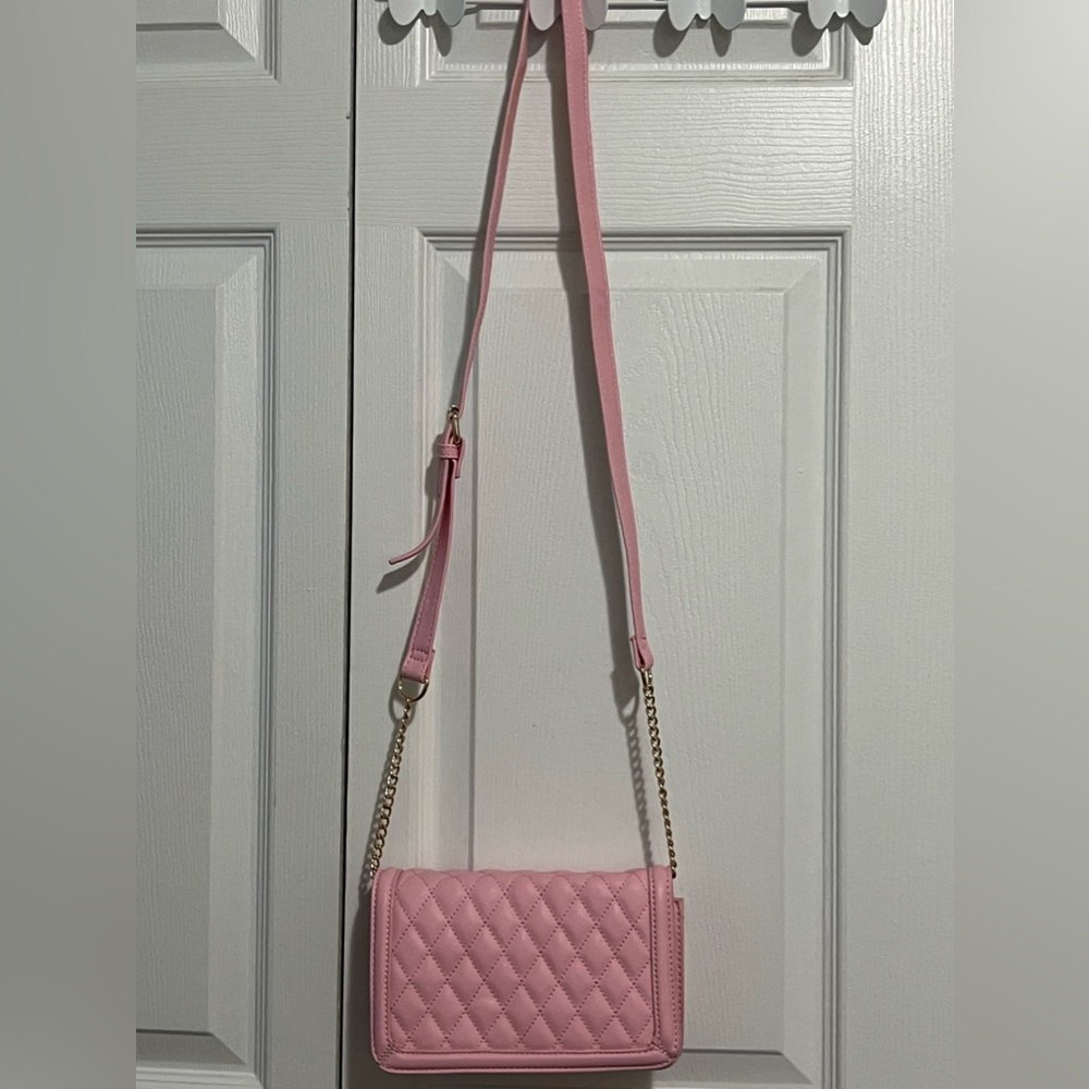 Purse, pink with gold accents.